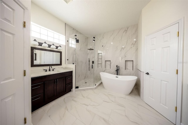 878 Cardinal Pointe Cv, Sanford, FL 32771 - bathroom featuring vanity, marble finish floor, a freestanding tub, a textured ceiling, and a marble finish shower