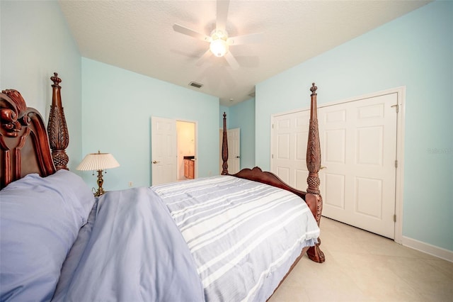 878 Cardinal Pointe Cv, Sanford, FL 32771 - bedroom with visible vents, light tile patterned flooring, baseboards, a textured ceiling, and a ceiling fan