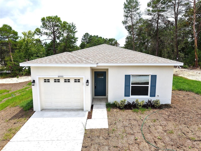 8990 Glenarm Way, Weeki Wachee, FL 34613 - ranch-style home with roof with shingles, an attached garage, concrete driveway, and stucco siding