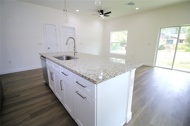 8990 Glenarm Way, Weeki Wachee, FL 34613 - kitchen featuring a sink, healthy amount of natural light, dark wood-style flooring, stainless steel dishwasher, and recessed lighting