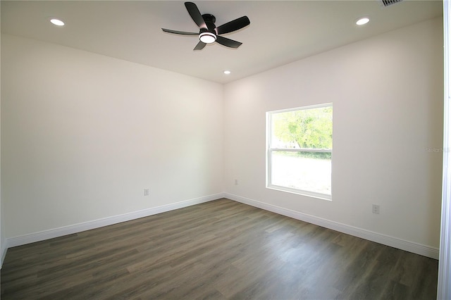 8990 Glenarm Way, Weeki Wachee, FL 34613 - empty room with ceiling fan, dark wood-style floors, recessed lighting, and baseboards