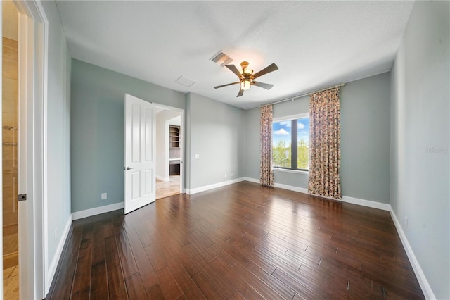 7624 Pointe Venezia Dr, Orlando, FL 32836 - empty room with ceiling fan and wood finished floors