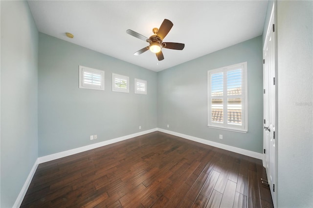 7624 Pointe Venezia Dr, Orlando, FL 32836 - spare room with a ceiling fan, dark wood-type flooring, and a smoke detector