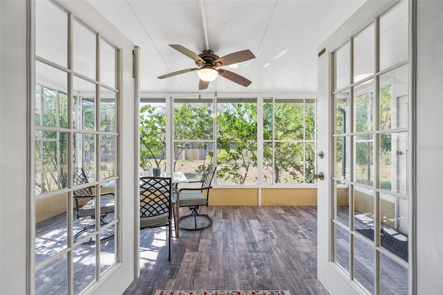 sunroom featuring a healthy amount of sunlight and wood finished floors