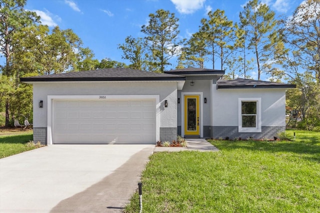3851 W Wilburton Dr, Citrus Springs, FL 34433 - view of front of home featuring stucco siding, brick siding, a front yard, concrete driveway, and an attached garage