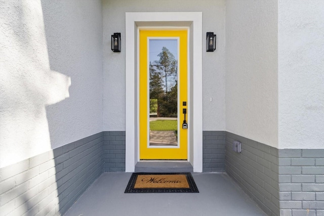 3851 W Wilburton Dr, Citrus Springs, FL 34433 - property entrance with stucco siding