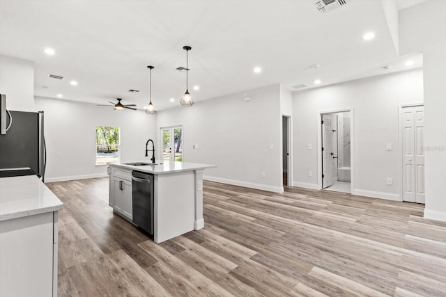 3851 W Wilburton Dr, Citrus Springs, FL 34433 - kitchen with a sink, appliances with stainless steel finishes, visible vents, ceiling fan, and recessed lighting