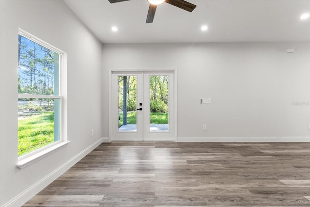 3851 W Wilburton Dr, Citrus Springs, FL 34433 - spare room featuring ceiling fan, a wealth of natural light, and baseboards