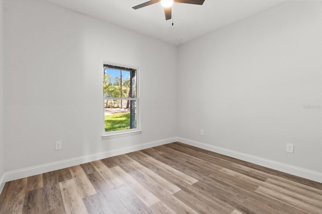 3851 W Wilburton Dr, Citrus Springs, FL 34433 - unfurnished room featuring ceiling fan, wood finished floors, and baseboards