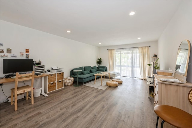 living room featuring recessed lighting and light wood-style floors