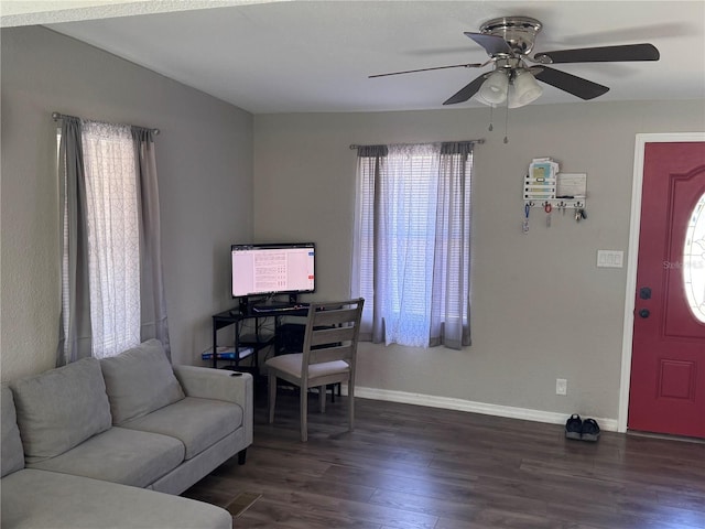 9400 SE 119th St, Belleview, FL 34420 - living area featuring plenty of natural light, baseboards, wood finished floors, and ceiling fan