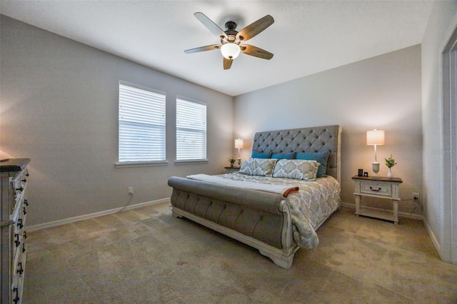 bedroom with baseboards, a ceiling fan, and carpet flooring