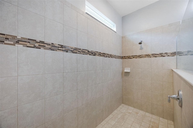 full bath featuring tiled shower