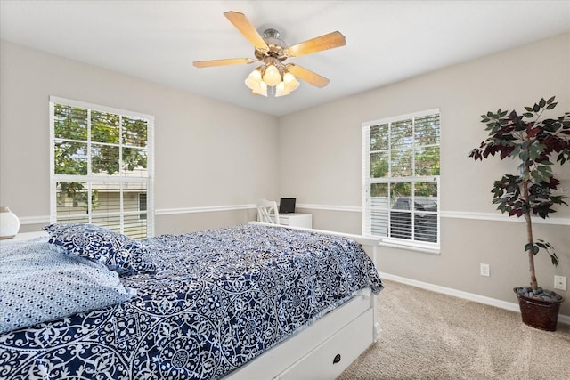 955 Seminole St, Clermont, FL 34711 - carpeted bedroom featuring a ceiling fan and baseboards