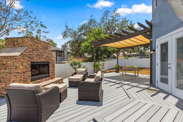 955 Seminole St, Clermont, FL 34711 - wooden deck with french doors, an outdoor living space with a fireplace, a fenced backyard, and a pergola