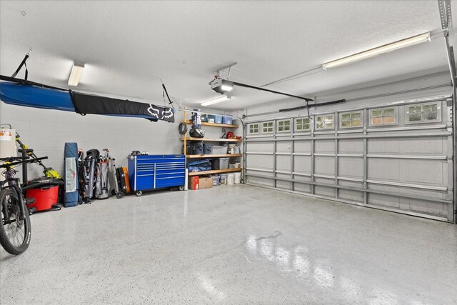 955 Seminole St, Clermont, FL 34711 - garage featuring a garage door opener