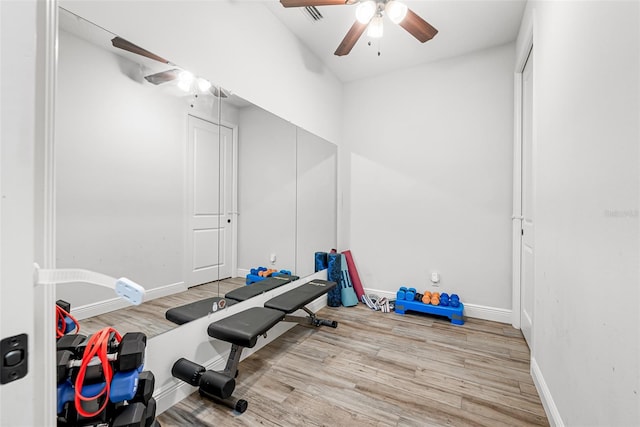 42368 W Cashew Ct, Eustis, FL 32736 - workout area with baseboards, visible vents, wood finished floors, and ceiling fan