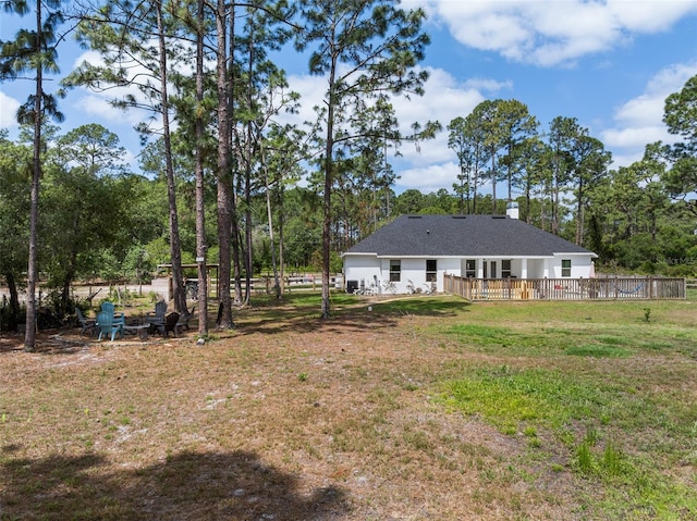 42368 W Cashew Ct, Eustis, FL 32736 - view of yard featuring a deck and fence