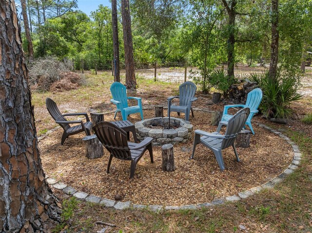 42368 W Cashew Ct, Eustis, FL 32736 - view of yard featuring an outdoor fire pit