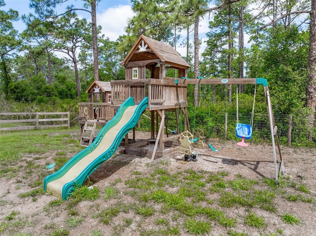 42368 W Cashew Ct, Eustis, FL 32736 - communal playground featuring fence
