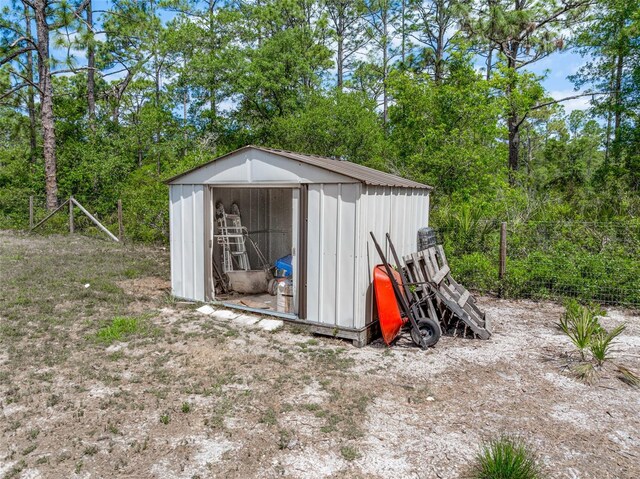 42368 W Cashew Ct, Eustis, FL 32736 - view of shed featuring fence