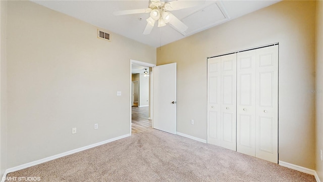 unfurnished bedroom featuring visible vents, a ceiling fan, a closet, baseboards, and carpet flooring