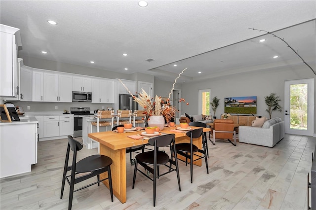 6725 SW 131st Cir, Ocala, FL 34481 - dining area with recessed lighting and light wood finished floors