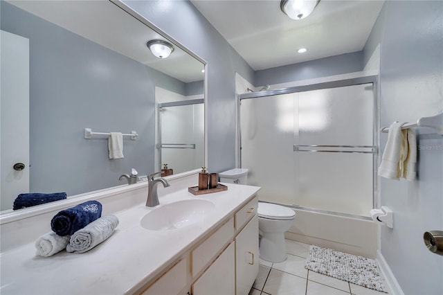819 Haulover Dr, Altamonte Springs, FL 32714 - full bath with tile patterned floors, vanity, toilet, and combined bath / shower with glass door