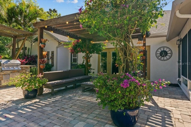 view of patio / terrace with a pergola, area for grilling, an outdoor hangout area, and grilling area