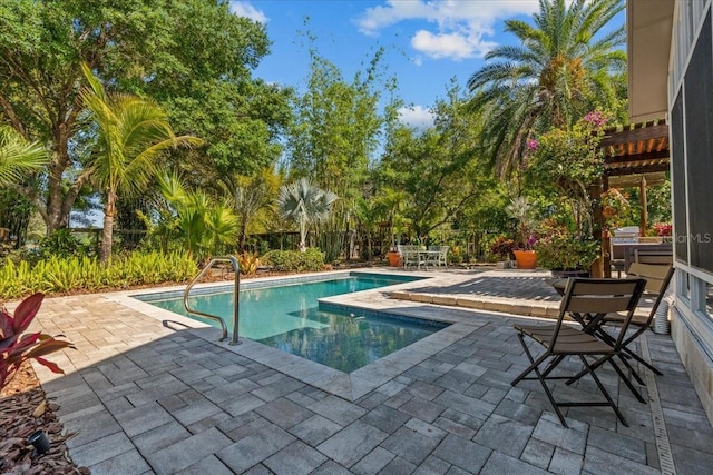 pool with a patio area