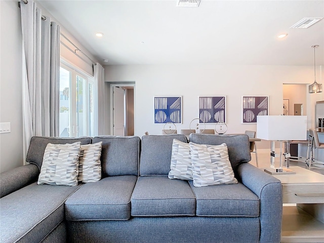7770 Sandy Ridge Dr Unit 139, Reunion, FL 34747 - living room featuring recessed lighting and visible vents