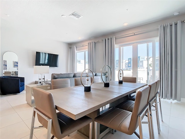 7770 Sandy Ridge Dr Unit 139, Reunion, FL 34747 - dining space featuring recessed lighting, visible vents, and light tile patterned floors