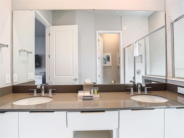 7770 Sandy Ridge Dr Unit 139, Reunion, FL 34747 - bathroom with a sink, double vanity, and a stall shower