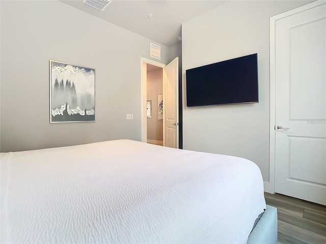 7770 Sandy Ridge Dr Unit 139, Reunion, FL 34747 - bedroom featuring visible vents and dark wood-style floors