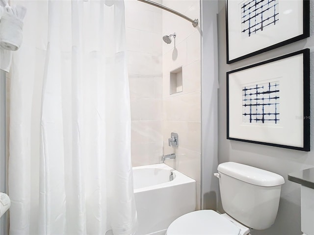 7770 Sandy Ridge Dr Unit 139, Reunion, FL 34747 - full bathroom featuring toilet and shower / bathtub combination with curtain