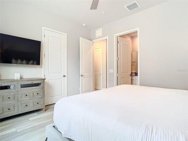 7770 Sandy Ridge Dr Unit 139, Reunion, FL 34747 - bedroom with visible vents, light wood finished floors, and a ceiling fan
