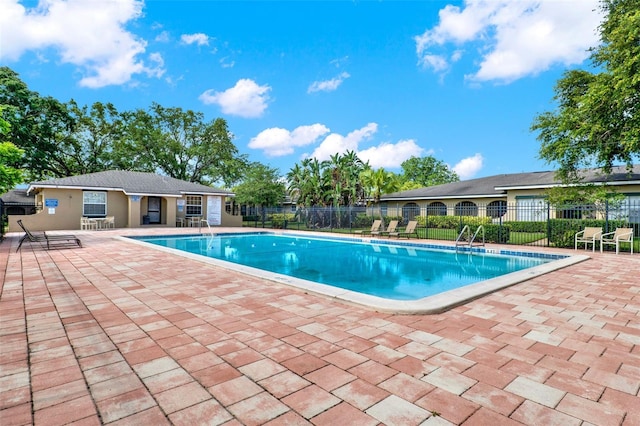 516 Polaris Loop Unit 110, Casselberry, FL 32707 - community pool with a patio area and fence