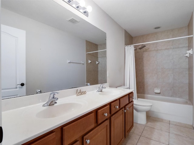 full bath with visible vents, tile patterned floors, shower / bath combo, and a sink