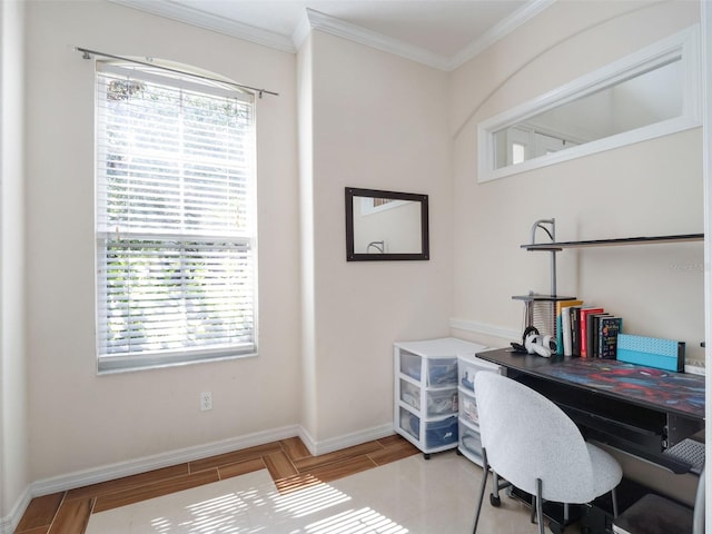 office area with plenty of natural light, wood finished floors, baseboards, and crown molding