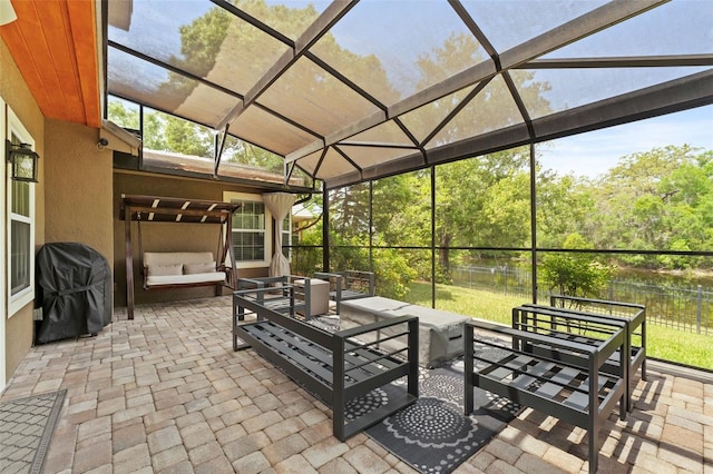 14037 Fairway Willow Ln, Winter Garden, FL 34787 - view of patio / terrace with outdoor lounge area, area for grilling, and a lanai