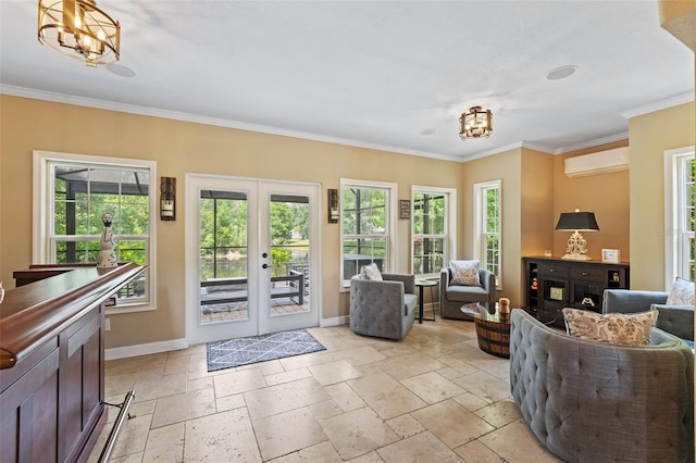 14037 Fairway Willow Ln, Winter Garden, FL 34787 - foyer entrance featuring a wall mounted AC, plenty of natural light, stone tile floors, ornamental molding, and french doors