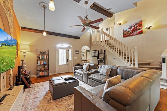 14037 Fairway Willow Ln, Winter Garden, FL 34787 - living room with stairs, wood finished floors, and a ceiling fan