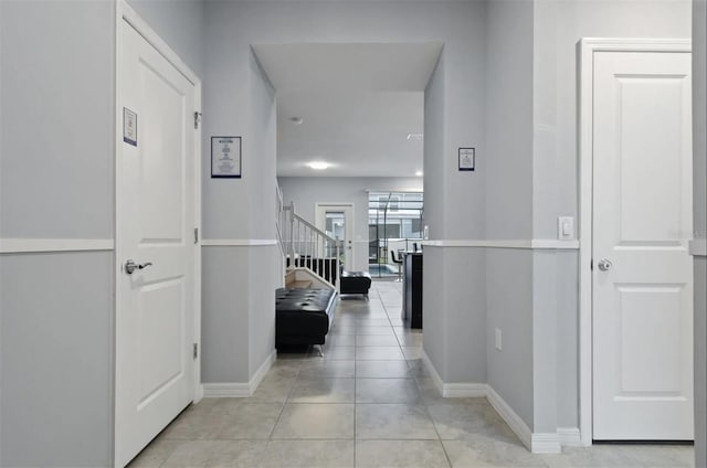 3806 Lana Ave, Davenport, FL 33897 - hallway with light tile patterned floors and stairway