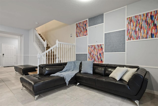 3806 Lana Ave, Davenport, FL 33897 - living room with stairway, wainscoting, and tile patterned flooring