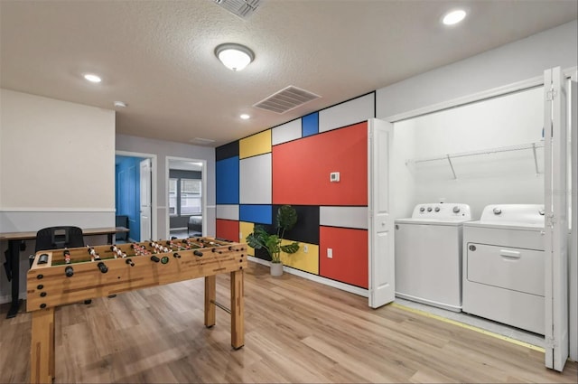 3806 Lana Ave, Davenport, FL 33897 - game room featuring separate washer and dryer, light wood-type flooring, a desk, a textured ceiling, and recessed lighting
