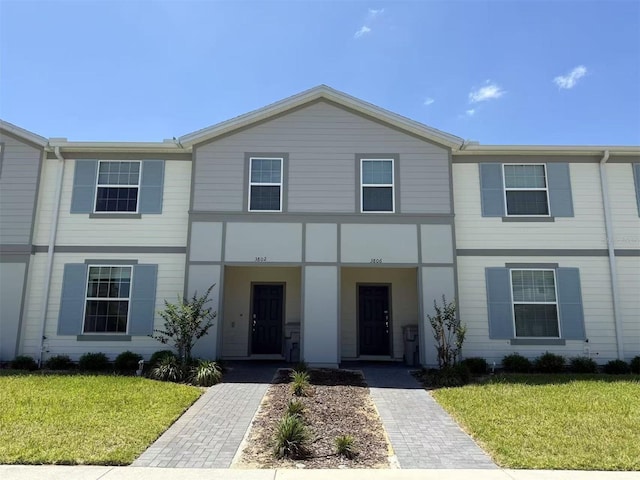 3806 Lana Ave, Davenport, FL 33897 - view of property with a front yard