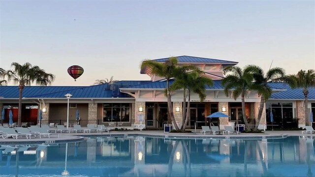 3806 Lana Ave, Davenport, FL 33897 - community pool featuring a patio