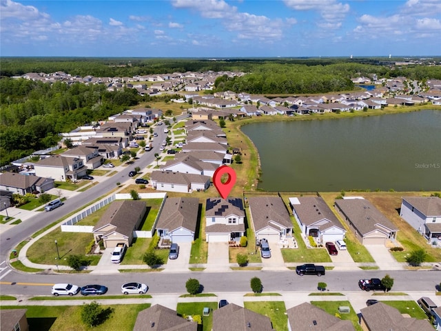 bird's eye view with a water view and a residential view