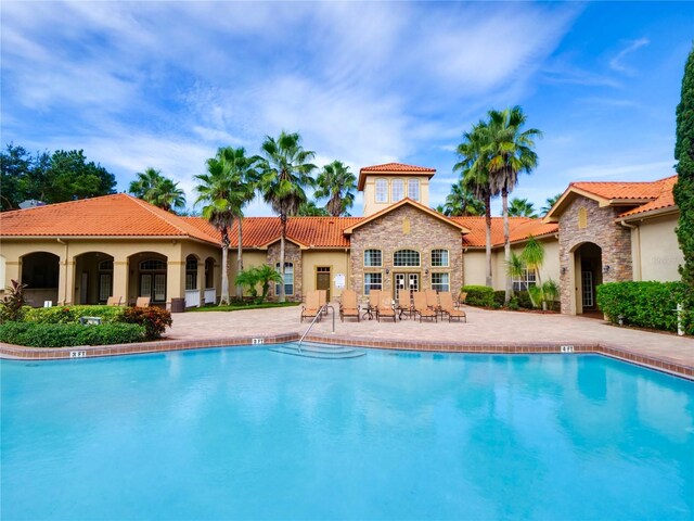 pool with a patio