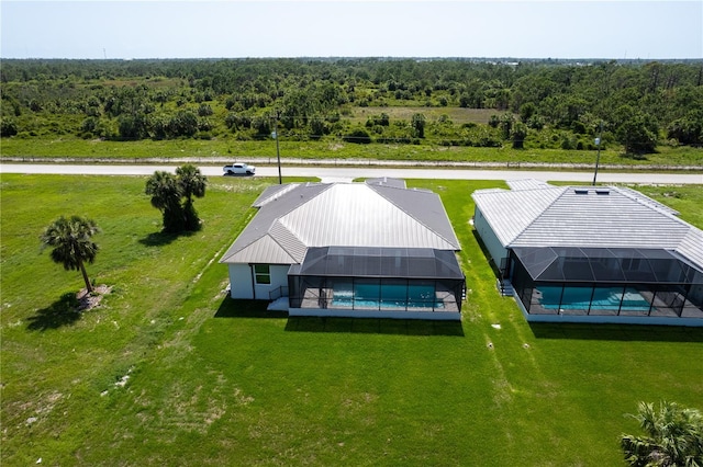 211 Rotonda Blvd S, Rotonda West, FL 33947 - aerial view of property and surrounding area featuring a pool area and a forest